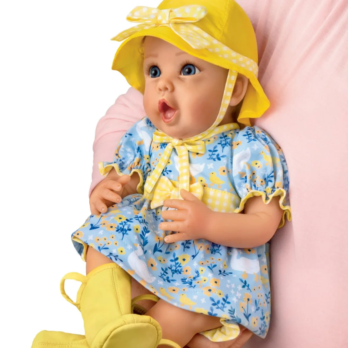 The Ashton-Drake Galleries Singing in The Rain So Truly Real® Interactive Lifelike Baby Girl Doll That Babbles with Custom 4-Piece Rain Themed Ensemble Complete with Rain Boots and A Bucket Hat 21"-Inches